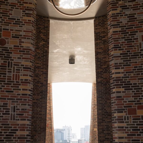 The foyer’s circle mirrors create an ethereal illusion